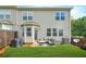 Private backyard with green lawn, patio area and privacy fence at 5830 Keystone Pt, Lithonia, GA 30058