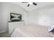 Bedroom with ensuite with a TV on the dresser, closet, and comfortable bed at 5830 Keystone Pt, Lithonia, GA 30058