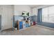Playroom with ample storage and natural light at 5830 Keystone Pt, Lithonia, GA 30058