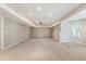 Spacious finished basement provides ample room for entertainment, with neutral carpet and recessed lighting at 963 Hawk Creek Trl, Lawrenceville, GA 30043