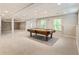 Spacious basement with a pool table, neutral walls, and recessed lighting at 963 Hawk Creek Trl, Lawrenceville, GA 30043