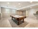 Spacious basement with a pool table, neutral walls, and recessed lighting at 963 Hawk Creek Trl, Lawrenceville, GA 30043