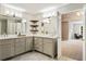 Bathroom with double vanity, granite countertops and view of Primary bedroom at 963 Hawk Creek Trl, Lawrenceville, GA 30043