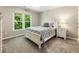 Bedroom features double window, soft light and carpet floor at 963 Hawk Creek Trl, Lawrenceville, GA 30043
