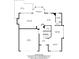 First floor plan with kitchen, living room, dining area, and garage at 963 Hawk Creek Trl, Lawrenceville, GA 30043