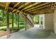 Covered patio provides shade and access to the backyard oasis, perfect for outdoor entertaining at 963 Hawk Creek Trl, Lawrenceville, GA 30043