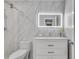 Modern bathroom features a tile shower, vanity, and updated fixtures at 1015 Dunbar Dr, Dunwoody, GA 30338