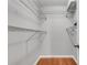 Closet featuring wire shelving, hardwood floors, and neutral paint at 1015 Dunbar Dr, Dunwoody, GA 30338