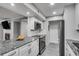 Modern kitchen with granite countertops and stainless steel appliances at 1015 Dunbar Dr, Dunwoody, GA 30338