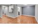Open-concept living room with updated kitchen at 1015 Dunbar Dr, Dunwoody, GA 30338