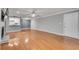 An extensive living room offering hardwood floors, recessed lights, a fireplace, and an open view of the kitchen at 1015 Dunbar Dr, Dunwoody, GA 30338