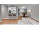 Cozy living room with modern furnishings and a view of the updated kitchen at 1015 Dunbar Dr, Dunwoody, GA 30338