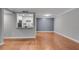 View of the living room featuring hardwood floors and neutral gray walls at 1015 Dunbar Dr, Dunwoody, GA 30338