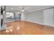 Open-concept living room featuring hardwood floors, and open view to the kitchen at 1015 Dunbar Dr, Dunwoody, GA 30338