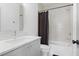 Bathroom boasts a modern sink, marble countertop, and subway tile shower at 3 Becker Nw Pl, Atlanta, GA 30307