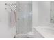 Bright bathroom with a tiled shower, modern fixtures, and white cabinetry at 3 Becker Nw Pl, Atlanta, GA 30307