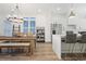 Open concept living with dining area, kitchen, and stainless steel appliances at 3 Becker Nw Pl, Atlanta, GA 30307