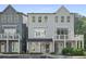 Charming three-story townhome with balcony and neutral gray paint at 3 Becker Nw Pl, Atlanta, GA 30307