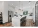 Bright, spacious kitchen features a large island, stainless appliances, and modern finishes at 3 Becker Nw Pl, Atlanta, GA 30307