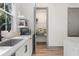 Bright kitchen with view to walk-in pantry with organized shelving at 3 Becker Nw Pl, Atlanta, GA 30307