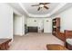 Spacious bonus room with neutral walls, carpet flooring, a day bed and modern decor with a ceiling fan at 3182 Windsor Lake Ne Dr, Atlanta, GA 30319