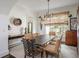 Elegant dining room with designer light fixture, table and chairs at 3182 Windsor Lake Ne Dr, Atlanta, GA 30319