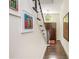 Foyer features hardwood floors, staircase and art, providing an inviting entrance at 3182 Windsor Lake Ne Dr, Atlanta, GA 30319