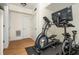 A well-lit home gym featuring an elliptical machine and stationary bike, ideal for fitness enthusiasts at 3182 Windsor Lake Ne Dr, Atlanta, GA 30319