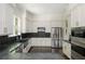 Modern kitchen features stainless steel appliances, sleek countertops, and ample cabinet space at 3182 Windsor Lake Ne Dr, Atlanta, GA 30319