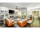 Bright and airy living room with hardwood floors, fireplace, built-in shelves, and access to the outdoors at 3182 Windsor Lake Ne Dr, Atlanta, GA 30319