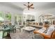 Spacious living room flowing into dining area and kitchen with plenty of natural light at 3182 Windsor Lake Ne Dr, Atlanta, GA 30319