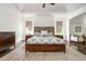 A spacious bedroom boasts a king bed, hardwood floors, and ample closet space at 3182 Windsor Lake Ne Dr, Atlanta, GA 30319