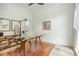 Bright office with a glass top desk, neutral walls, decor and tiled floors at 3182 Windsor Lake Ne Dr, Atlanta, GA 30319