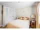 Cozy bedroom featuring a comfortable bed and a large closet for ample storage space at 3184 Newcastle Way, Snellville, GA 30039