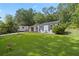 Lovely one-story home with a spacious front yard, RV parking, and a cozy, inviting porch at 3184 Newcastle Way, Snellville, GA 30039