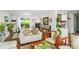 Cozy living room with bright natural light, hardwood floors, and comfortable seating arrangement at 3184 Newcastle Way, Snellville, GA 30039