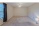 Empty bedroom with a large window at 5334 Post Road Pass, Stone Mountain, GA 30088