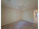 Bedroom with standard closet and a view to the hallway and natural light at 5334 Post Road Pass, Stone Mountain, GA 30088