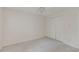 Bright, clean bedroom with neutral walls, carpeting, and a ceiling fan at 5334 Post Road Pass, Stone Mountain, GA 30088