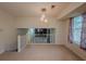 Open living room with a view of downstairs at 5334 Post Road Pass, Stone Mountain, GA 30088