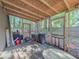 Screened patio perfect for outdoor entertainment with forest view at 5334 Post Road Pass, Stone Mountain, GA 30088