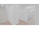 Basement hallway leading to a stylish bathroom at 605 Buttercup Trce, Johns Creek, GA 30022