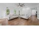 Bright, open living room offers hardwood floors and great natural light at 605 Buttercup Trce, Johns Creek, GA 30022