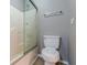 Clean bathroom with a glass-enclosed shower and toilet, providing a functional and well-maintained space at 709 Eastwood Rise, Stone Mountain, GA 30087