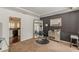 Bonus room with dark accent wall, carpet floors, wainscoting and potential as a salon or additional living space at 709 Eastwood Rise, Stone Mountain, GA 30087