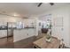 Open-concept living space with stainless steel appliances and modern accents at 709 Eastwood Rise, Stone Mountain, GA 30087