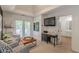 Bright main bedroom boasts double doors to the outside and an ensuite bath at 709 Eastwood Rise, Stone Mountain, GA 30087