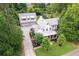 Scenic aerial view of the traditional home and its detached garage at 201 Dobbs Rd, Woodstock, GA 30188