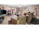 Relaxing finished basement with comfortable seating, a large television, and ample room for entertaining at 5034 Kingsbridge Pass, Powder Springs, GA 30127