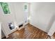 Spacious living room has lots of natural light and hardwood floors at 5034 Kingsbridge Pass, Powder Springs, GA 30127